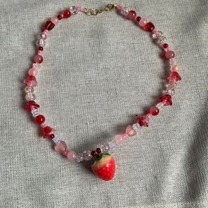 Necklace with strawberry charm in pink red stylized cottage ecore